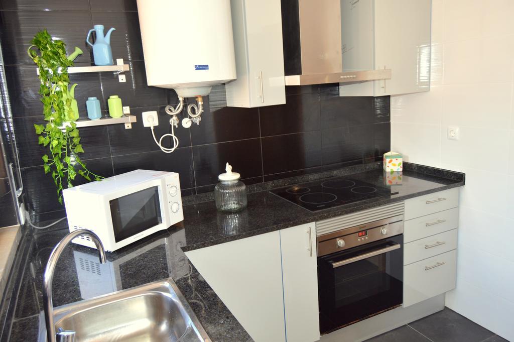 Apartamento Glamour Apartment Manta Rota Bilik gambar