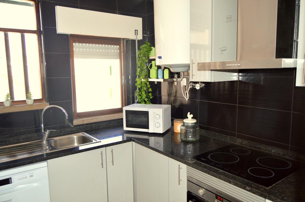 Apartamento Glamour Apartment Manta Rota Bilik gambar